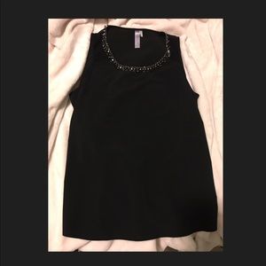 Black blouse with spikes around the collar